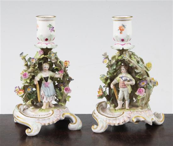 A pair of Meissen arbour chambersticks, early 20th century, 13.5cm, both with losses